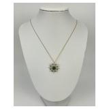 14KT Gold Green Stone Diamond Sun Necklace.
