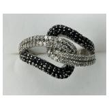 14KT Gold black & White Round Diamond Loop Ring.