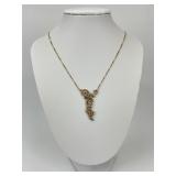 14KT Gold Fancy Filigree Diamond Necklace.