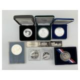 6 .999 1oz Silver, 2 Sterling & 1 50% Round.