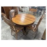 Ornate Oak Pedestal Table & Carved Chairs.