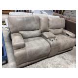 Exquisite Suade Elec. Reclining Love Seat.