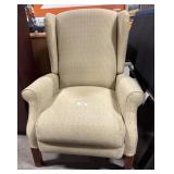 Clean Upholstered Winged Recliner.