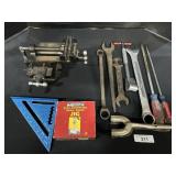 Bench Vice, Wrenches, Triangle, Drill Press Jig.