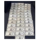 34 $1 Dollar Blue Seal Bills.