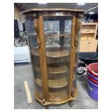 Oak Bow Front Curio Cabinet.