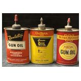 Vintage Metal Gun Oil Tins.