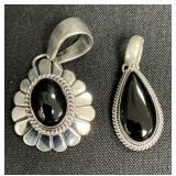 2 Sterling Silver Onyx Pendants.