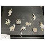 Sterling Silver Pins.