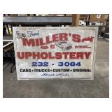 Fred Millers Upholstery Advertising Sign.