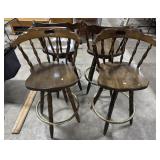 (4) High Top Swiveling Bar Stools.