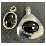2 Sterling Silver Onyx Pendants.