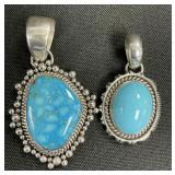 2 Sterling Silver Turquoise Pendants.