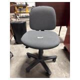 Swiveling Upholstered Office Chair.