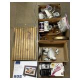 Dustbuster, Cutting Board, Cameras, Mugs.