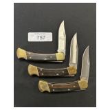 3 Buck 110 Wooden Handle Pocket Knives.