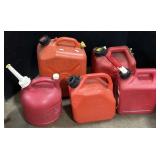 5 Plastic Gas Cans.