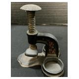 Cast Iron McGillï¿½s Paper Fastener.