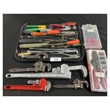 Wire Strippers, Pipe Wrenches, Screwdrivers.