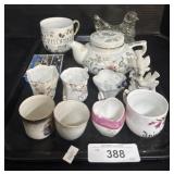 Small Teacups, Teapot, Glass Chicken.
