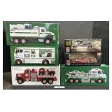 4 Various Hess Trucks, 2 Ertl Die Cast Cars.