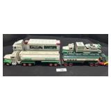 4 Vintage Hess Trucks.