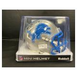 Autographed Amon Ra ST Brown Mini Helmet.