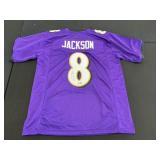 Autographed Lamar Jackson Jersey.