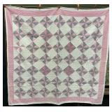 Habdstitched Pinwheel Crib Quilt.