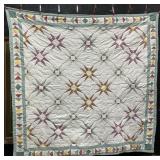 Star Patterned Quilt.