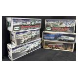 6 Hess Trucks.
