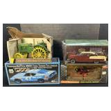 3 Doe Cast Cars & 1 Die Cast Tractor.