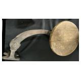 Cast Iron Swing Arm Stool.