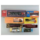 Engine, Open Freight, Reefer & Caboose Train Cars.
