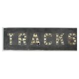 Tracks Railroad Sign With Cat Eye Reflectors.