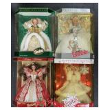 4 NOS Happy Holidays Barbies.