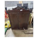 Ornate Hanging Cabinet.