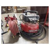 Porter Cable Air Compressor & Reel w/Hose.