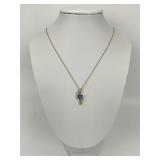 14KT Gold Tanzanite Diamond Pendant on 10K Chain.