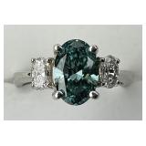 14KT Gold Teal Sapphire and Diamond Ring.