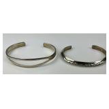 1 Sterling , 1 Silver Native American Bangles.