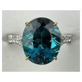 Platinum & 18KT Gold Blue Topaz Diamond Ring.