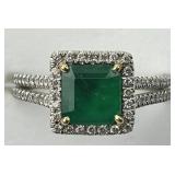 18KT Gold Lab Emerald & Diamond Halo Ring.