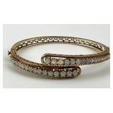 14KT Gold Cabochon Opal Hinged Bangle.