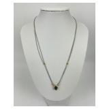 18KT Gold Emerald & Diamond Halo Necklace.