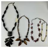 4 Native American Beaded, Bone Carved Necklaces.