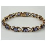 14KT Gold Amethyst Tennis Bracelet.