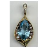 18KT Gold Blue Topaz & Diamond Pendant.