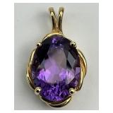 Brilliant 14KT Gold Large Cut Amethyst Pendant.