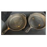 2 Large Lodge Cast Iron Skillets.